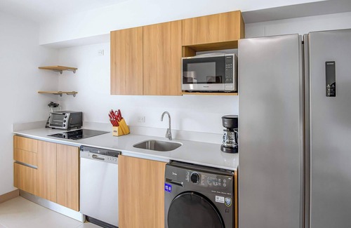 Barrio Santa Lucia Condo | Upstay - Stunning New Condo w Private Patio
