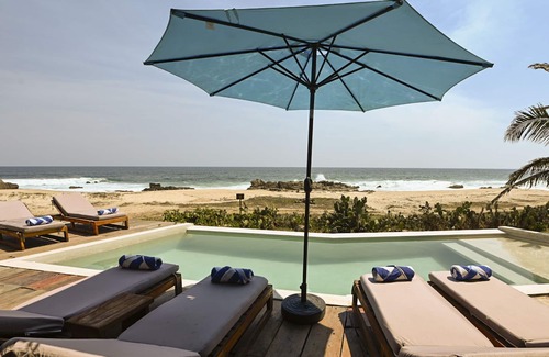 Santa Maria Tonameca Villa | UtopiAmar Las Palmas: a design beach room in a spectacular front beach setting.