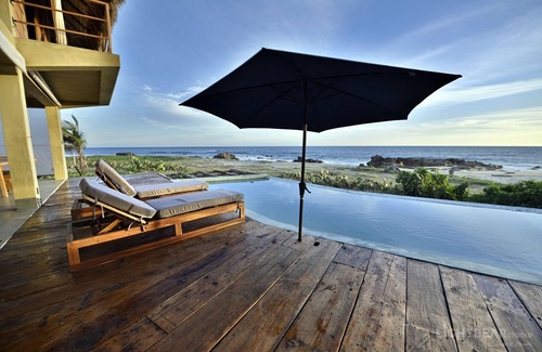 Santa Maria Tonameca Villa | UtopiAmar Las Palmas: a design beach room in a spectacular front beach setting.