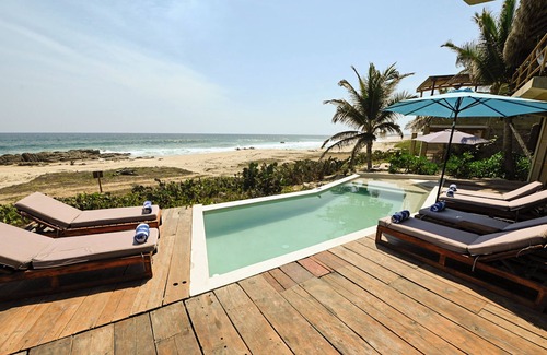 Santa Maria Tonameca Villa | UtopiAmar Las Palmas: a design beach room in a spectacular front beach setting.