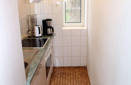 Uttum Apartment | Uttumer Mühle: Aletta - Gemütliche Erdgeschosswohnung im Müllerhaus der Uttumer Mühle