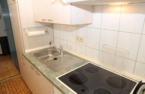 Uttum Apartment | Uttumer Mühle: Aletta - Gemütliche Erdgeschosswohnung im Müllerhaus der Uttumer Mühle