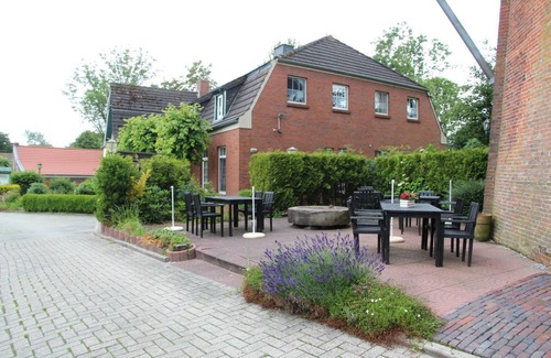 Uttum Apartment | Uttumer Mühle: Daike - Schöne Og-ferienwohnung für 4 Personen an der Uttumer Mühle