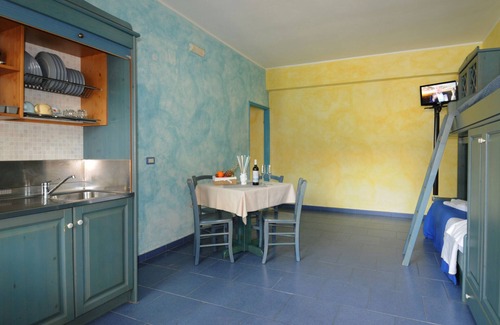 Province of Messina House | Vacation Home "Oasi Azzurra - Bilocale Plus 2" with Sea View, Shared Pool & Shared Terraces