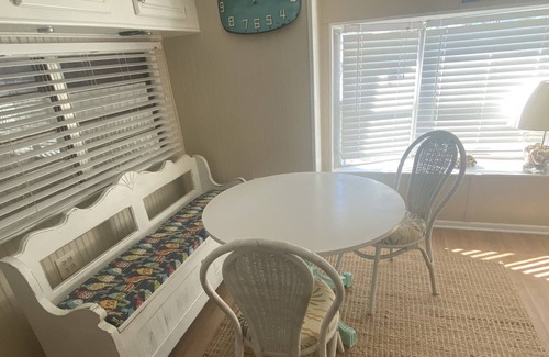 Nettles Island Cottage | Vintage cozy beach house waterfront on grand canal with dock