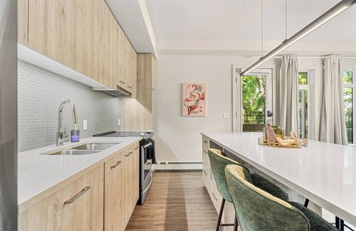 Whyte ave Condo | Walk to Whyte Ave, river views, and UofA Hospital from your cozy suite