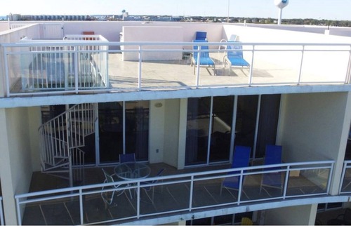 Fort Walton Beach Condo | Walking On Sunshine Penthouse w/ Private Rooftop Terrace & Hot Tub - VPH04