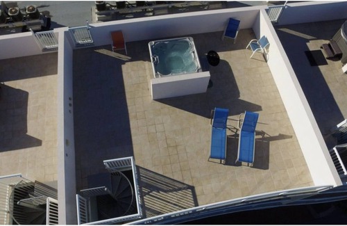 Fort Walton Beach Condo | Walking On Sunshine Penthouse w/ Private Rooftop Terrace & Hot Tub - VPH04