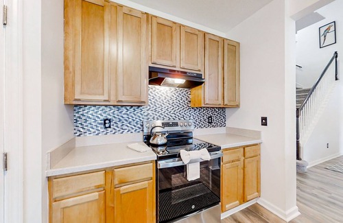 Westside House | Waterfront 2-story home with water views, patio, streaming, washer/dryer, & AC