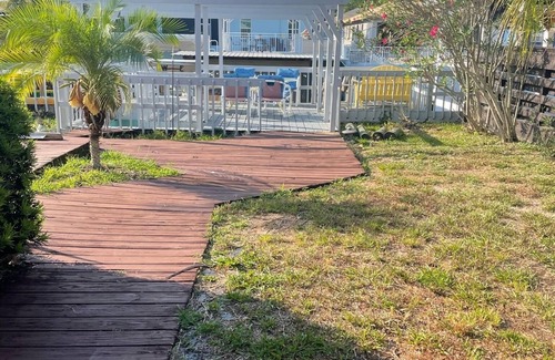 Indian Harbor Estates House | Waterfront Canal Cottage 2 bedroom /2 bath with 25 ft dock