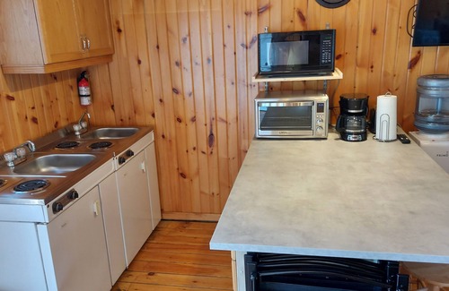 Combermere Cottage | Waterfront Cottage 3bdrm/4bath - Private Beach, Dock, Large Deck Fire pit, BBQs