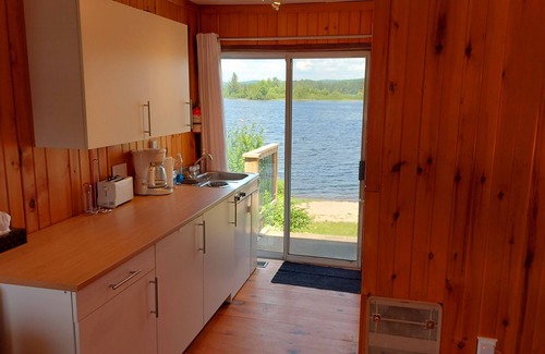 Combermere Cottage | Waterfront Cottage 3bdrm/4bath - Private Beach, Dock, Large Deck Fire pit, BBQs
