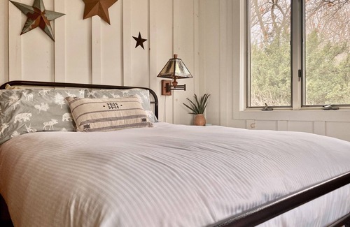 Morrisville Cabin | Waterfront Guesthouse, historic, cozy 5 star lodge facing Delaware River & Canal