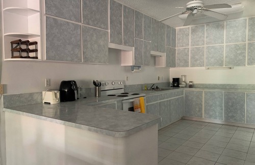 Williams Town House | Waterfront home with private dock near the beach