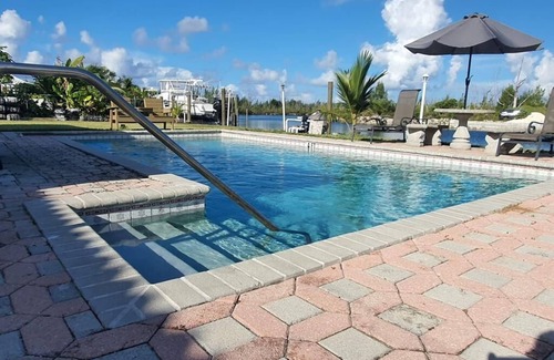 Williams Town House | Waterfront home with private dock near the beach