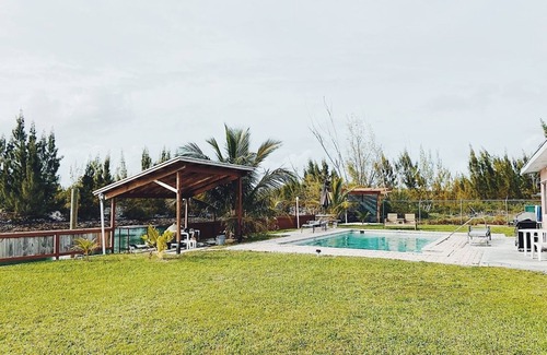 Williams Town House | Waterfront home with private dock near the beach