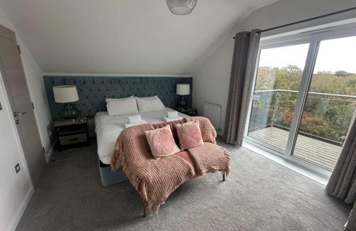 Winnard's Perch House | Wave Side Lodge 106B- Retallack Resort & Spa