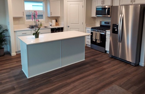Merced House | Welcome to our cozy 4 bed home with modern amenities.