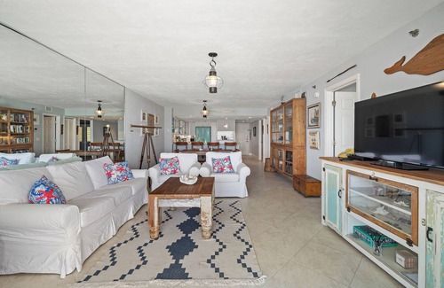 Bethune Beach Condo | Welcome to this stylish 2BR/2BA condo in Chadham By the Sea on a peaceful no-drive beach. Enjoy sweeping ocean views from the open living, dining, and kitchen area, all designed to showcase the scenery, with a calming beach-themed interior.