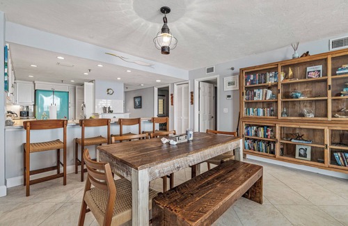 Bethune Beach Condo | Welcome to this stylish 2BR/2BA condo in Chadham By the Sea on a peaceful no-drive beach. Enjoy sweeping ocean views from the open living, dining, and kitchen area, all designed to showcase the scenery, with a calming beach-themed interior.