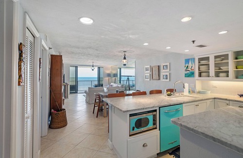Bethune Beach Condo | Welcome to this stylish 2BR/2BA condo in Chadham By the Sea on a peaceful no-drive beach. Enjoy sweeping ocean views from the open living, dining, and kitchen area, all designed to showcase the scenery, with a calming beach-themed interior.