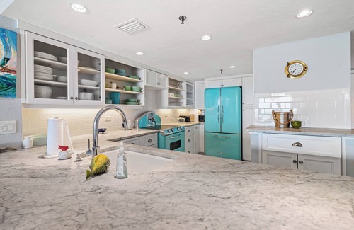 Bethune Beach Condo | Welcome to this stylish 2BR/2BA condo in Chadham By the Sea on a peaceful no-drive beach. Enjoy sweeping ocean views from the open living, dining, and kitchen area, all designed to showcase the scenery, with a calming beach-themed interior.