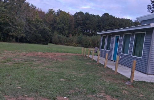 Cabot House | Well appointed house with outdoor space for kiddos to throw the ball in Cabot