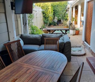 Plumstead House | Wembley Home -Heated pool, indoor braai, jacuzzi come relax