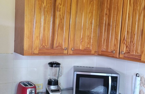 Jessups Village House | Wonderful 2-bedroom house with AC in charming Cotton Ground Village.