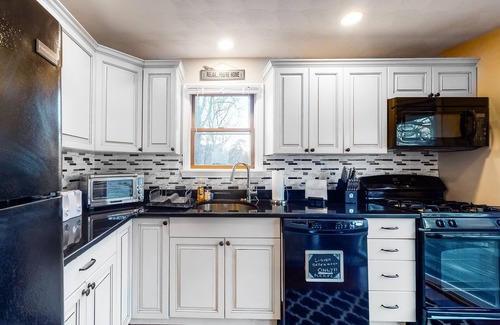 East Chop House | Wonderful three-story home with lovely decks, firepit, fast WiFi & washer/dryer