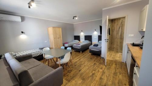Checiny Apartment | Wrzosowe Wzgórze 5 - Apartamenty