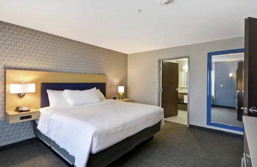 Alpine Center Hotel | Your Michigan Adventure: Minutes to Treetop Family Adventure. FREE Breakfast