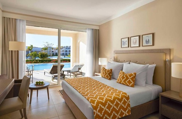 2 Swim-Up Rooms in Tranquil Adults-Only Setting + Spa & Private Beach