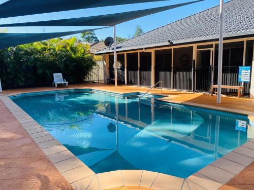 29 Satinwood Drive - Rainbow Shores. Pets. Pool. Wifi