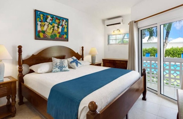 2BR Poolside Unit with Full Kitchen & Porch! Close to Scrub Island! Pool & Spa!