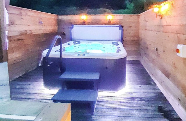 A fantastic property with hot tub and stunning views over the loch.