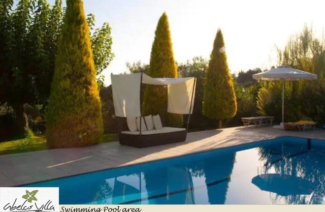 Abelos Villa (views, garden and private pool*)