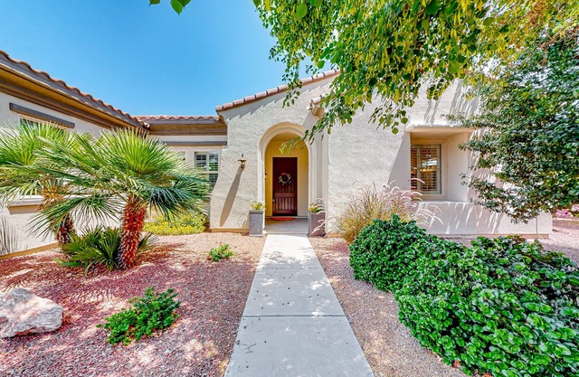 Amazing home with fitness room, tennis court, hot tub, pool, kitchen, & patio