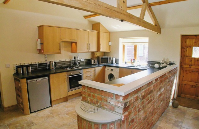 Barn conversion set on a small farm which enjoys lovely countryside views.