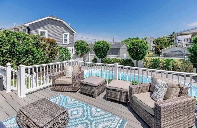 Beach Block Shoreline Retreat with Pool & Fire Pitn1 Minute Walk to Beach