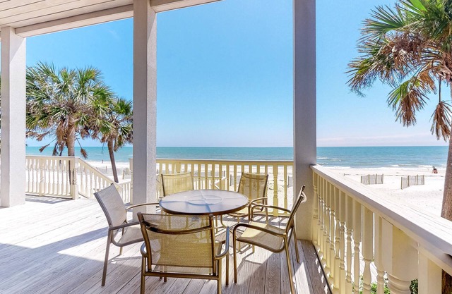 Beachfront dog-friendly home with spacious decks and on-site pool