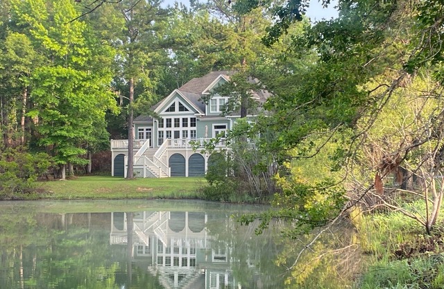 Beautiful Custom Home Overlooking Pond