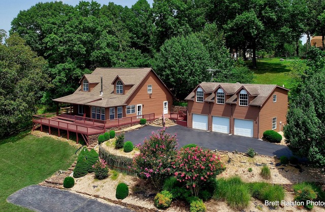 Beautiful Home on 18 acres with view of Beaver Lake and lake access.