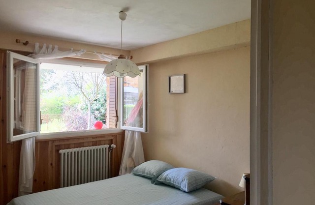 Chambre avec vue sur jardin
