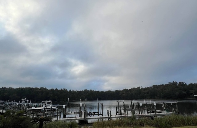 Charming 2 bedroom condo with waterfront/dock access! Community pool!