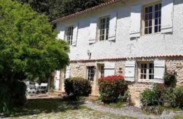 Charming stone house nestling on the edge of the forest
