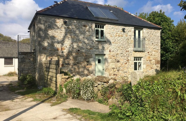 Classic Cornish Granite barn in a beautiful rural landscape.