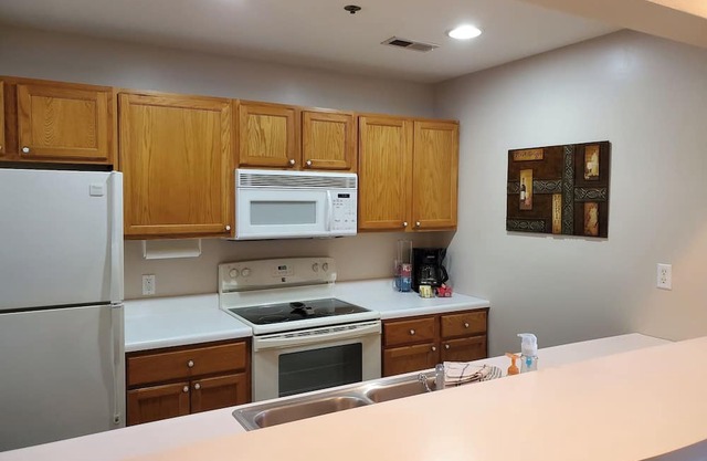 Cozy 2-bedroom condo with few steps, a boat slip, and WiFi in a great location!
