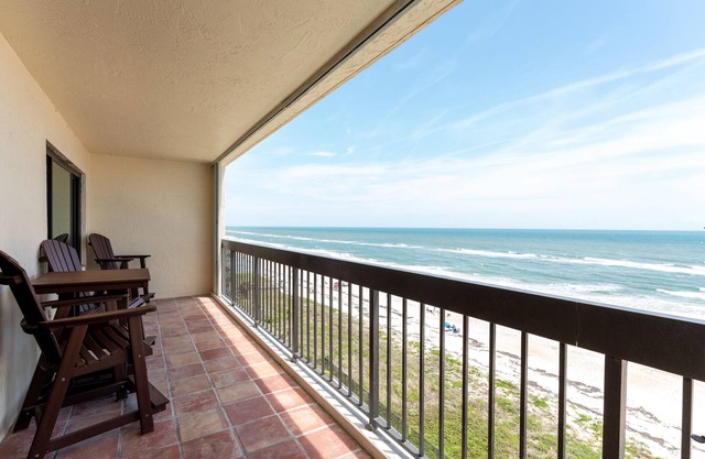 Direct oceanfront corner condo with big balcony, heated beachfront pool and garage parking