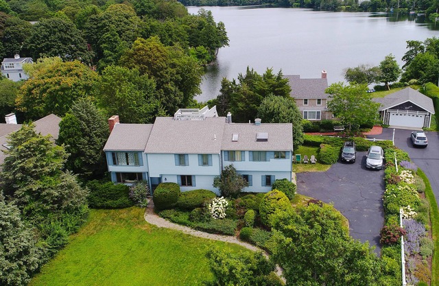 Dog-friendly, lakefront home with roof deck - blocks from the beach